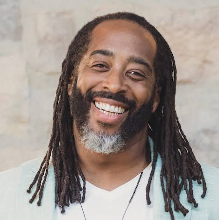 Photo of APhA2027 Keynote Speaker, Sekou Andrews
